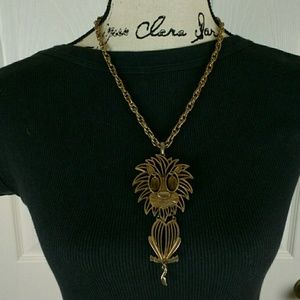 Large gold tone lion necklace, 20" long